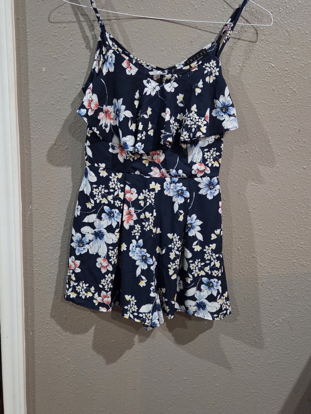 Trixxi Navy Floral Ruffle Romper with Blue and Coral Accents